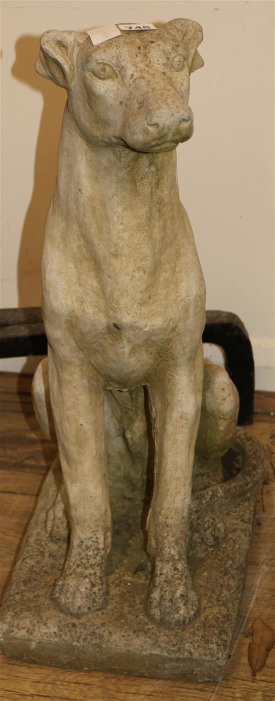 A stone model of a dog W.24cm